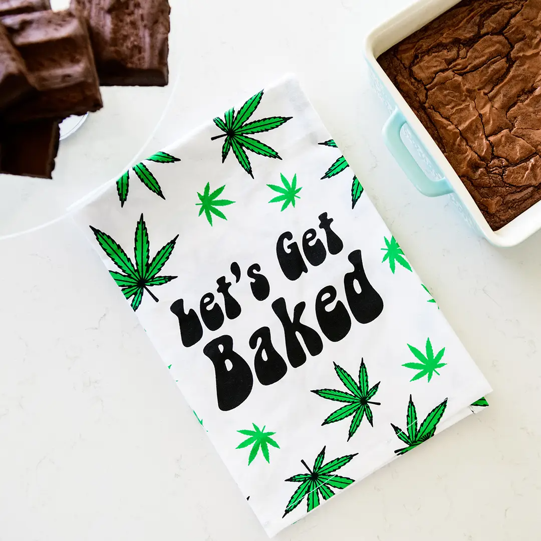 http://www.sourpussclothing.com/cdn/shop/products/lets_get_baked_dish_towel_3.png?v=1660133819