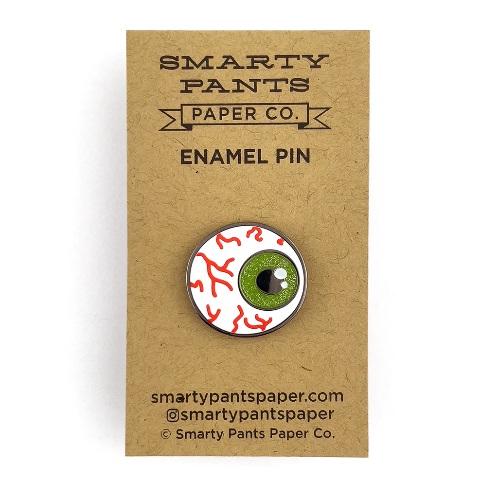SMARTY PANTS PAPER EYEBALL GLITTER ENAMEL PIN